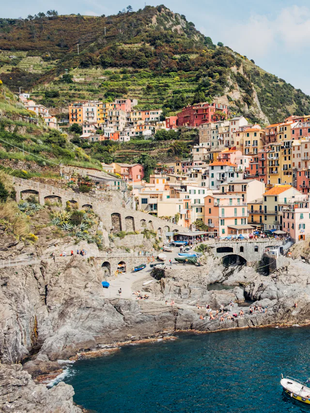 Manarola's coloured houses stacked on a cliff above the sea